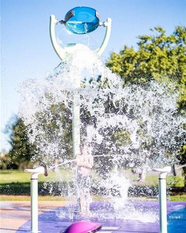 Splash-Park-Boy-Standing-under-spout-2-DSCO1401_Sam-Demamiel.jpg